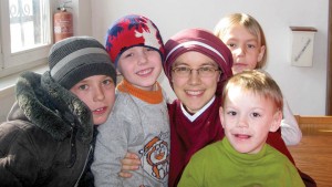 Sister Catherine Marie poses with children. (Photo courtesy of Sister Faustina Marie, CJD)