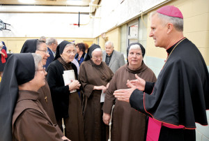 Bishop Johnston greets the Sisters of St. Francis of the Holy Eucharist after the Vespers service at Co-Cathedral Parish in St. Joseph. (Joe Cory/Key photo)
