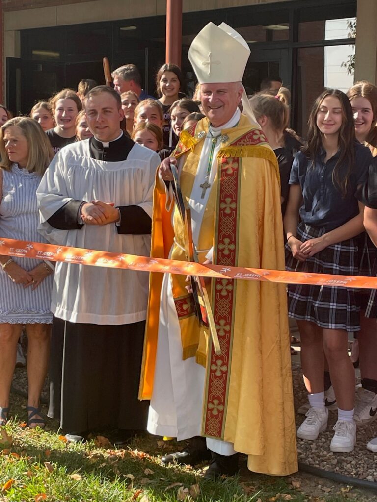 Ribbon cutting marks beginning for St. Joseph Catholic Academy offices