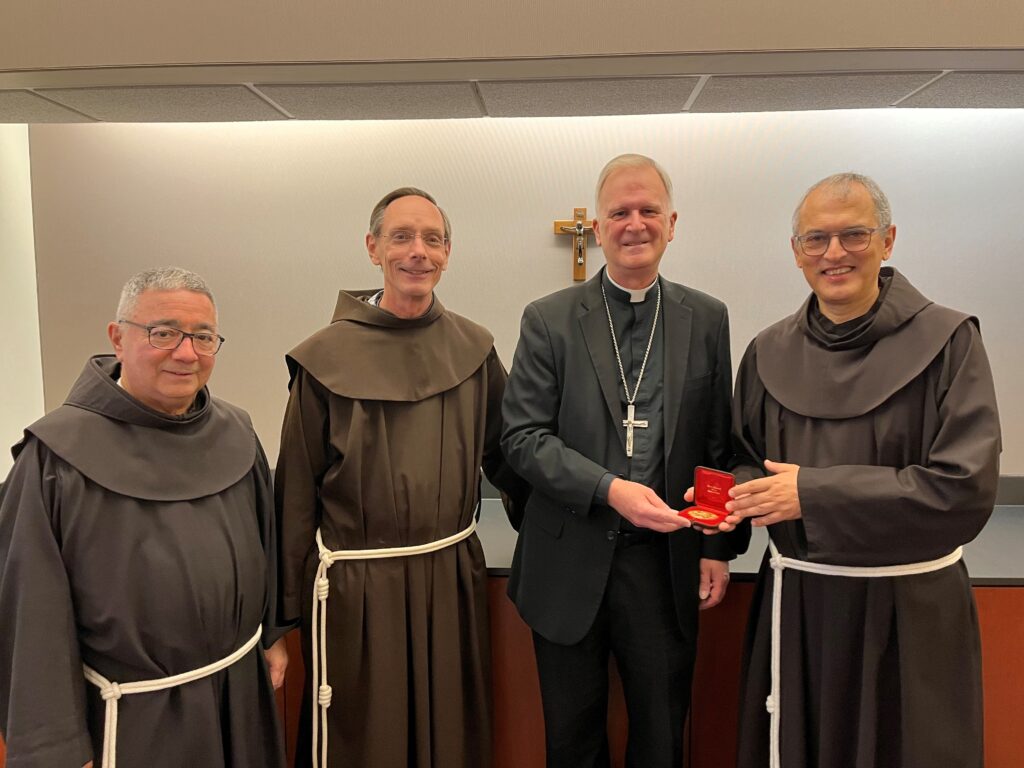 Bishop Johnston welcomes Franciscan Friars to KC